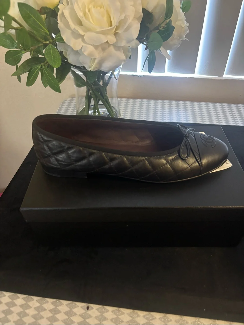 CHANEL Black Quilted Leather Ballet Flats with CC Cap Toe